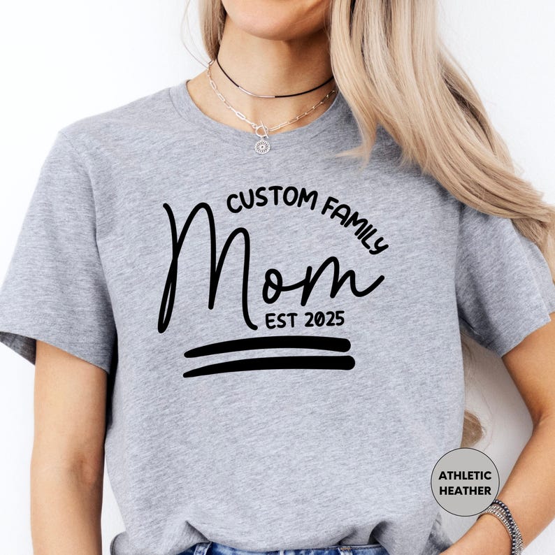 a woman wearing a t - shirt that says custom family mom est 2055