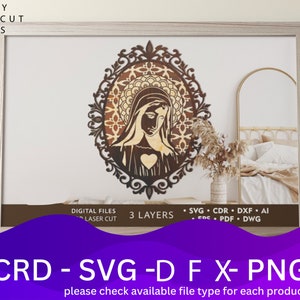 May include: A laser cut design of the Virgin Mary with a heart in her chest, surrounded by a decorative floral frame. The design is in brown and white and has three layers. The image includes the text "CRD - SVG - D F X - PNG" and "please check available file type for each product".