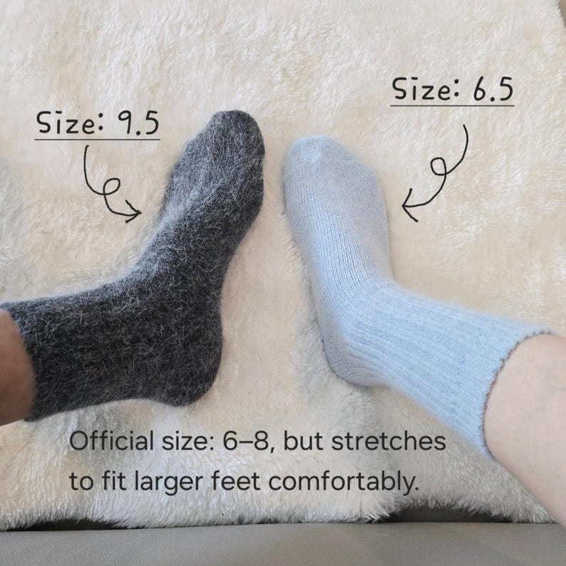 May include: A pair of socks, one dark grey and one light blue, with text labels indicating Size: 9.5 and Size: 6.5. Additional text states: Official size: 6-8, but stretches to fit larger feet comfortably. The socks have a fuzzy, textured appearance.