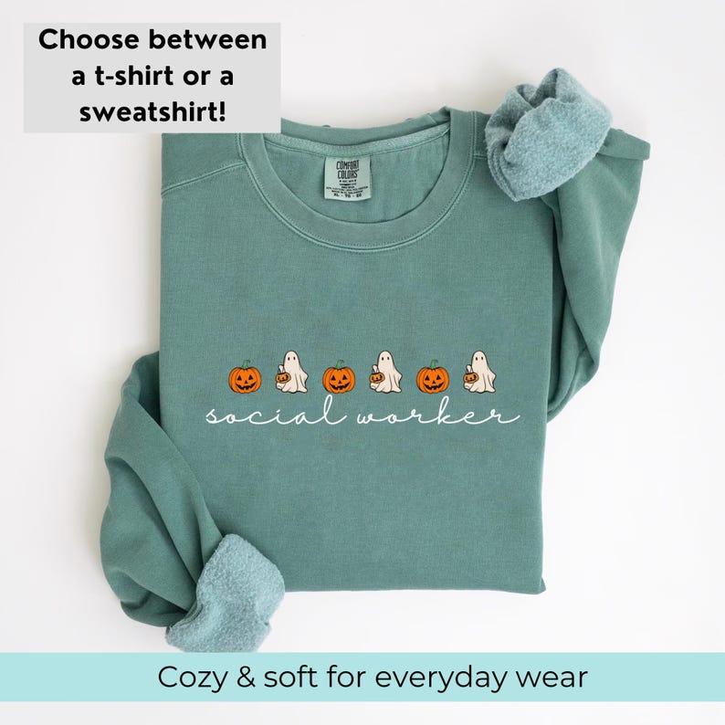May include: Teal blue sweatshirt with a white graphic of ghosts carrying pumpkins and the text "social worker".