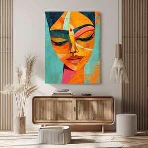 a painting of a woman's face on a wall