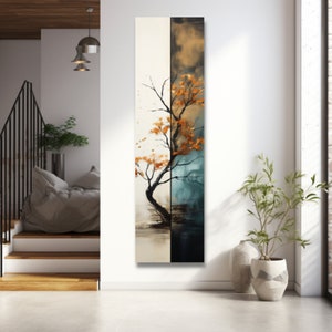 Può includere: Dipinto astratto di un albero con foglie arancioni su uno sfondo bianco e blu. L'albero è diviso a metà, con un lato che mostra uno sfondo bianco e l'altro uno sfondo blu.