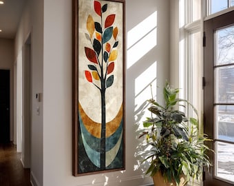 Puede incluir: Una pieza de arte mural enmarcada, alta y rectangular, que presenta un árbol estilizado con hojas rojas, naranjas y verde azulado oscuro. El fondo tiene un acabado crema texturizado con formas geométricas curvas en la base.