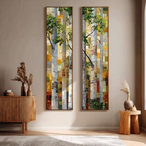 May include: Two vertical rectangular wall art panels featuring a mosaic-style forest scene with white birch tree trunks, green foliage, and a background of layered yellow, orange, and brown square tiles framed in thin metallic gold borders.