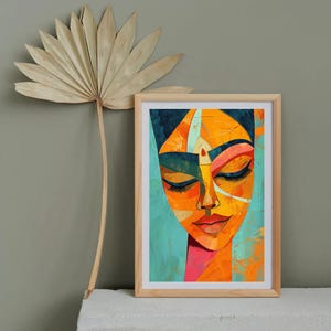 a painting of a woman's face on a wall