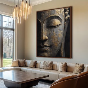 a large, ornate Buddha head portrait hanging on the wall of a modern living room. The room has a comfortable seating arrangement with a couch and a coffee table, and the space is illuminated by a chandelier with hanging lights.