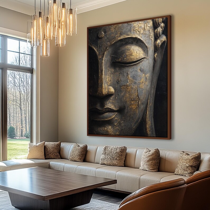 a large, ornate Buddha head portrait hanging on the wall of a modern living room. The room has a comfortable seating arrangement with a couch and a coffee table, and the space is illuminated by a chandelier with hanging lights.