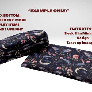 May include: Two decorative pillows with a dark blue floral pattern featuring butterflies, flowers, and crescent moons. One pillow has a box bottom and the other has a flat bottom. The text "EXAMPLE ONLY:" is in the image.