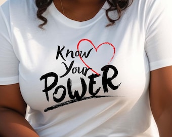 May include: White t-shirt with a black and red graphic that says "Know Your Power" with a red heart.