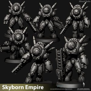 May include: A set of three ceramic mugs with a speckled, matte finish. The mugs are in shades of cream, light gray, and dark gray. Each mug has a simple, minimalist design, perfect for coffee or tea.