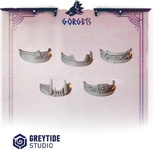 May include: Five gray gorgets with various decorative designs. The gorgets are displayed against a light background with the text "GORGETS" and the "GREYTIDE STUDIO" logo. Each gorget has a unique shape and ornamentation.