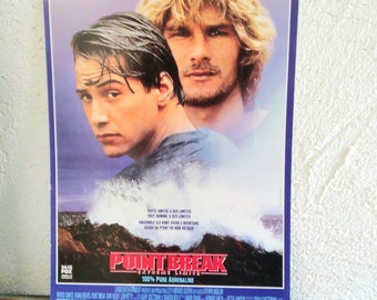 Affiche publicitaire originale de cinéma français de 1991, 20 x 27 cm, Patrick Swayze et Keanu Reeves 'Point Break'.