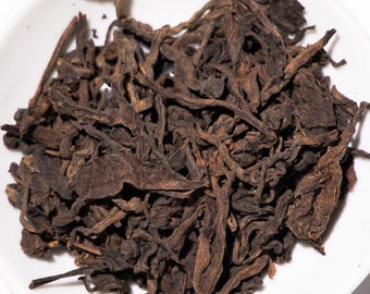 Té de hojas sueltas Shu Pu-Erh Noir: aroma a frutos secos y madera