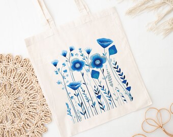 Donkerblauwe boho-draagtas met wilde bloemen | Botanische draagtas met wilde bloemen | Katoenen draagtas met blauwe bloemen