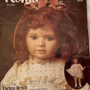 May include: A porcelain doll kit called "Roma" by Thelma Resch. The doll is 23 inches tall and wears a pink and white dress. The kit includes moulds for the head, arms, legs, and a shoulder plate. The kit also includes instructions, a body pattern, and a colour photo.