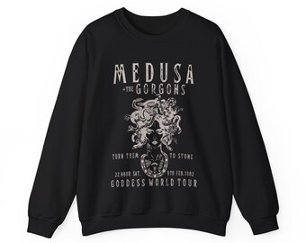 May include: Black sweatshirt with a white graphic print of Medusa, the Gorgon, with the text "MEDUSA +THE GORGONS TURN THEM TO STONE 22:00HR SAT. 8TH FEB.1982 GODDESS WORLD TOUR"