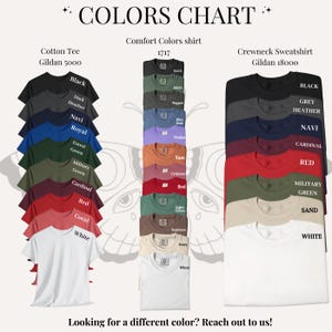 May include: A color chart displays various t-shirts and sweatshirts in a range of colors, including black, navy, red, and white. The chart includes the text "COLORS CHART" and "Looking for a different color? Reach out to us!"