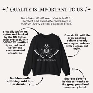 May include: Black sweatshirt with a white moth design and the text "DELUXE DESIGNS". The sweatshirt is made of a medium-heavy cotton-polyester blend. Features include a crew neckline, double-needle stitching, and a tear-away label.