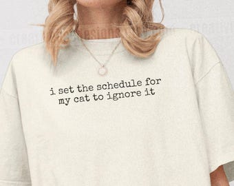 I Set The Schedule For My Cat To Ignore It Shirt Funny Cat Humor Shirt Cat Mom Shirt Cat Dad Tee Gift For Cat Owners Four Legged Word