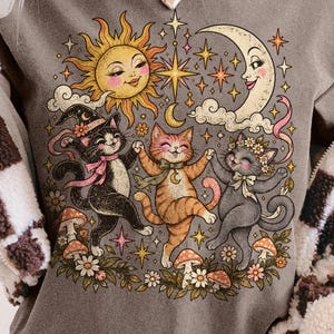 Celestial Dancing Cats Shirt Sun Moon Stars Cat Tee Whimsigoth Witchy Cat Lover Gift Vintage 70s Cottagecore Comfort Colors Graphic Tee