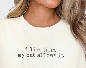 I Live Here My Cat Allows It Shirt Cat Mom Dad Gift Cat Humor Shirt Cat Mom Shirt Cat Dad Tee Gift For Cat Owners Four Legged Word Funny Cat