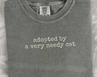 Adopted By A Very Needy Cat Shirt Cat Mom Shirt Cat Dad Tee Gift For Cat Owners Clingy Cat Gift Four Legged Word Velcro Cat Gift