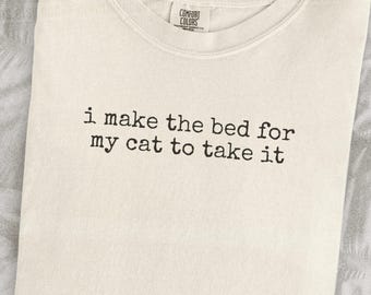 I Make The Bed For My Cat To Take It Shirt Funny Cat Humor Shirt Cat Mom Shirt Cat Dad Tee Gift For Cat Owners Four Legged Word
