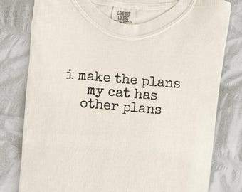 I Make The Plans My Cat Has Other Plans Shirt Funny Cat Humor Shirt Cat Mom Shirt Cat Dad Tee Gift For Cat Owners Four Legged Word