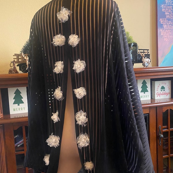 Open-back striped black cocoon coat with tulle flowers