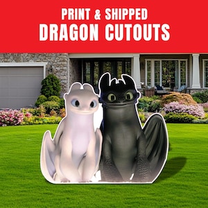 May include: Two dragon cutouts, one white and one black, are displayed on a green lawn in front of a house. The white dragon has blue eyes, and the black dragon has green eyes. The text "PRINT & SHIPPED DRAGON CUTOUTS" is in a red banner above.
