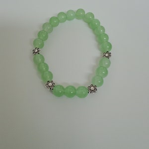 Beaded bracelet- light green with flower jewels