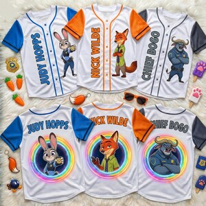 May include: Six baseball jerseys featuring Zootopia characters Judy Hopps, Nick Wilde, and Chief Bogo. The front designs show the characters with their names, while the back designs feature the characters inside colorful rainbow circles.