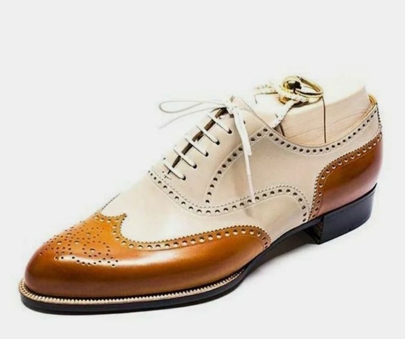 Handmade men’s two-tone leather Oxford shoes, cream and tan wingtip brogue dress shoes with closed lacing, black leather sole, formal wedding or business footwear, luxury custom handmade shoes.
