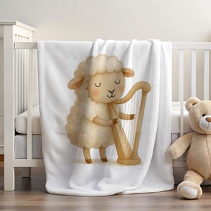 Cozy nursery throw Sheep plays harp