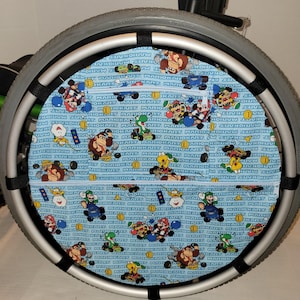 Wheelchair wheel bag, Pouch zipper pockets adds storage for manual wheels. Personalized Wheelbag Custom sizes available, video game gift