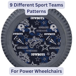 May include: A gray power wheelchair tire with a black and blue Dallas Cowboys pattern. The tire has the words "Dallas Cowboys" and "COWBOYS" repeated on it. The tire is for power wheelchairs.