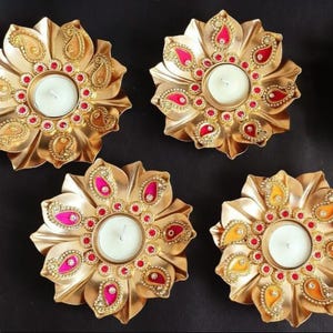 Decorated tealight holders/ candle holders/ Pooja gifts/ Thamboolam/ Return Gifts/ kundan/ housewarming gifts/ wedding gifts/Babyshower gift