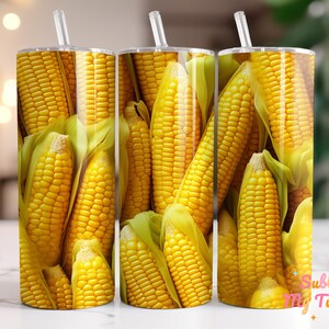 May include: Three stainless steel tumblers with a design of yellow corn on the outside. The tumblers are all the same size and shape.