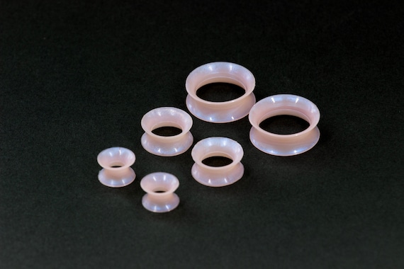 Pink Pearlescent Silicone Tunnels: Double Flare Flexi Tunnels - Stretched Ears