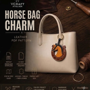 May include: A beige leather handbag with a horse-shaped leather bag charm attached to the handle. The charm features a brown horseshoe, a black mane, and a tan horse head. Text on the image reads VCRAFT ATELIER HORSE BAG CHARM LEATHER PDF PATTERN.