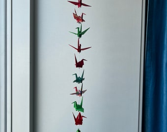 A string of 10 origami cranes - mixed patterns and colors