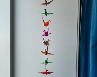 A string of 10 origami cranes - mixed patterns and colors