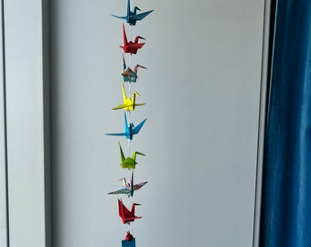 A string of 10 origami cranes - mixed patterns and colors