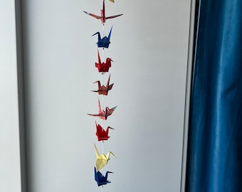 A string of 10 origami cranes - mixed patterns and colors
