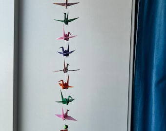 A string of 10 origami cranes - mixed patterns and colors