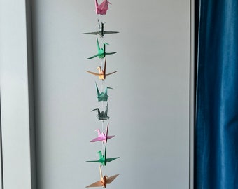 A string of 10 origami cranes - mixed patterns and colors