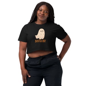 May include: A black cropped t-shirt featuring a white ghost illustration and the text "BOO'LEAN!" in orange.
