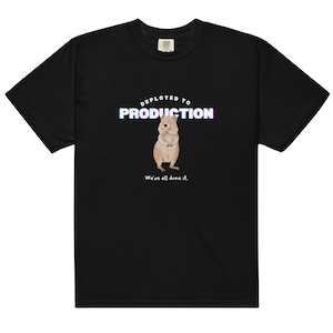 May include: Black t-shirt with a graphic of a quokka and the text "Deployed to Production" in a glitched font. The text "We've all done it." is below the graphic.