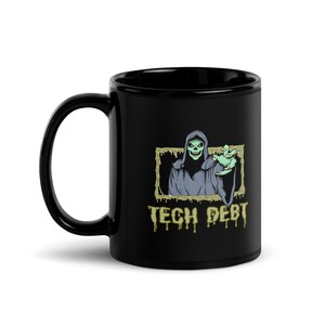 May include: Black coffee mug with a green and blue illustration of a grim reaper with the text "TECH DEBT" in dripping green letters.