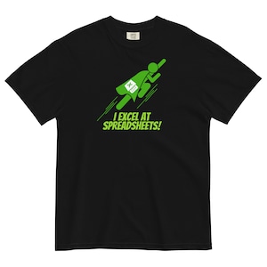 May include: Black t-shirt with a green graphic of a superhero flying with an Excel logo on their back. The text "I Excel at Spreadsheets!" is below the graphic.